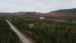 5.5K aerial stock footage of Highway 302, Omni Mount Washington Resort, Bretton Woods, autumn, Carroll, New Hampshire Aerial Stock Footage | AX150_204