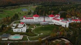 5.5K aerial stock footage orbiting Omni Mount Washington Resort, golf club, autumn, Carroll, New Hampshire Aerial Stock Footage | AX150_209