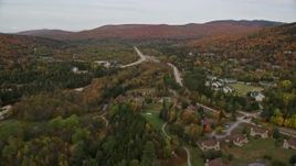 5.5K aerial stock footage approaching Base Station Road, Highway 302, over rural homes, Carroll, New Hampshire Aerial Stock Footage | AX150_211