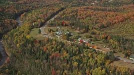 5.5K aerial stock footage flying by Highway 302, Mountain Roots Farm, autumn, Bethlehem, New Hampshire Aerial Stock Footage | AX150_230