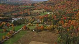 5.5K aerial stock footage approaching a rural home, colorful foliage in autumn, Sugar Hill, New Hampshire Aerial Stock Footage | AX150_243