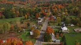 5.5K aerial stock footage flying over small rural town, approach Sugar Hill Road, autumn, Sugar Hill, New Hampshire Aerial Stock Footage | AX150_250E