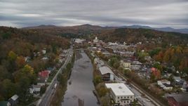5.5K aerial stock footage flying over homes and Winooski River, approach downtown, Vermont State House, autumn, Montpelier, Vermont Aerial Stock Footage | AX150_351E