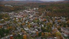 5.5K aerial stock footage flying by residential neighborhoods, colorful trees, and downtown in autumn, Montpelier, Vermont Aerial Stock Footage | AX150_378E