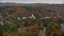 5.5K aerial stock footage flying by Vermont State House, revealing office buildings, autumn, Montpelier, Vermont Aerial Stock Footage | AX150_384E