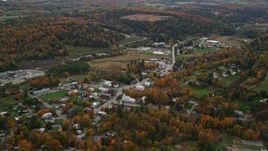 5.5K aerial stock footage flying over the small town of Williamstown, Vermont, and tilting to a church on Main Street Aerial Stock Footage | AX150_400E