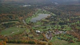 5.5K aerial stock footage approaching Lakeland Golf Course, Lake Pinneo, autumn, Quechee, Vermont Aerial Stock Footage | AX150_466E