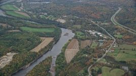 5.5K aerial stock footage flying by farms along the Connecticut River, autumn, Hartland, Vermont Aerial Stock Footage | AX151_046