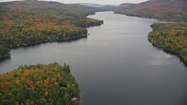5.5K aerial stock footage flying over waterfront homes, colorful forest, Lake Sunapee, autumn, Newbury, New Hampshire Aerial Stock Footage | AX151_084
