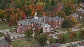 5.5K aerial stock footage orbiting Colgate Hall, Colby Sawyer College, autumn, New London, New Hampshire Aerial Stock Footage | AX151_100