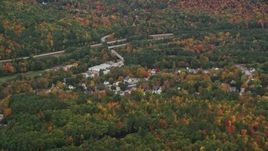 5.5K aerial stock footage flying by small rural town, colorful foliage, autumn, Warner, New Hampshire Aerial Stock Footage | AX151_122E