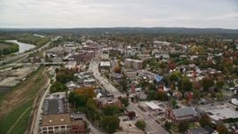 5.5K aerial stock footage flying over homes and downtown, by St Paul's Church, New Hampshire State House, autumn, Concord, New Hampshire Aerial Stock Footage | AX151_178E