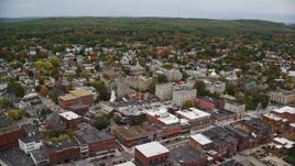 5.5K aerial stock footage orbiting New Hampshire State House, downtown in autumn, Concord, New Hampshire Aerial Stock Footage | AX151_187E