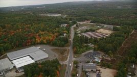 5.5K aerial stock footage flying over warehouse buildings, Sheep Davis Road, autumn, Pembroke, New Hampshire Aerial Stock Footage | AX152_001