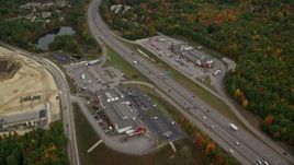 5.5K aerial stock footage approaching strip malls, Interstate 93, tilt down, autumn, Bow, New Hampshire Aerial Stock Footage | AX152_008E
