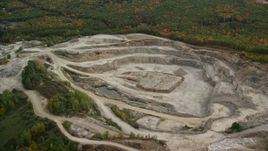 5.5K aerial stock footage flying over forest, approaching a quarry, pan right, autumn, Bow, New Hampshire Aerial Stock Footage | AX152_010E