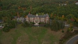 5.5K aerial stock footage approaching, flying over Mercy Hall, Mount Saint Mary College, autumn, Hooksett, New Hampshire Aerial Stock Footage | AX152_019