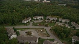 5.5K aerial stock footage approaching condominiums and tilt down, autumn, Hooksett, New Hampshire Aerial Stock Footage | AX152_022