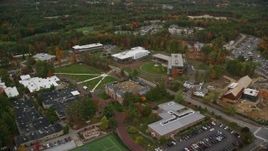 5.5K aerial stock footage flying over Southern New Hampshire University, pan left, autumn, Hooksett, New Hampshire Aerial Stock Footage | AX152_033E
