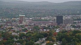 5.5K aerial stock footage of City Hall Plaza, Hampshire Plaza, downtown office towers, autumn, overcast, Manchester, New Hampshire Aerial Stock Footage | AX152_045E