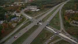 5.5K aerial stock footage approaching Interstate 93 and tilt down, autumn, Londonderry, New Hampshire Aerial Stock Footage | AX152_053