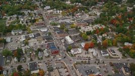 5.5K aerial stock footage flying by homes, downtown area, colorful foliage in autumn, Derry, New Hampshire Aerial Stock Footage | AX152_056E