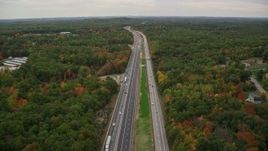 5.5K aerial stock footage flying over Interstate 93, forest, autumn, overcast, Derry, New Hampshire Aerial Stock Footage | AX152_063E