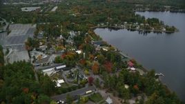 5.5K aerial stock footage orbiting Canobie Lake Park, colorful foliage in autumn, Salem, New Hampshire Aerial Stock Footage | AX152_070