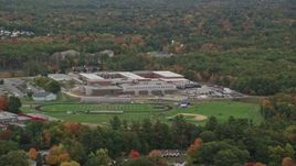 5.5K aerial stock footage flying by Salem High School, football practice, autumn, Salem, New Hampshire Aerial Stock Footage | AX152_079