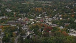 5.5K aerial stock footage flying by Methuen Fire Department, busy intersection, autumn, Methuen, Massachusetts Aerial Stock Footage | AX152_085