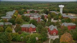 5.5K aerial stock footage orbiting Medfield State Hospital, colorful foliage, autumn, Medfield, Massachusetts Aerial Stock Footage | AX152_193E