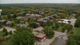 5.5K aerial stock footage orbiting Medfield State Hospital among fall foliage, autumn, Medfield, Massachusetts Aerial Stock Footage | AX152_195E