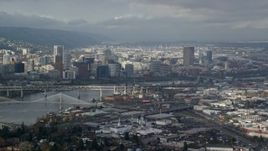 5.5K aerial stock footage of the cityscape view with partly cloudy skies, Downtown Portland, Oregon Aerial Stock Footage | AX153_018E