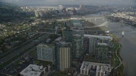 5.5K aerial stock footage flying over high-rises in South Waterfront and Interstate 5 toward Downtown Portland, Oregon Aerial Stock Footage | AX153_036