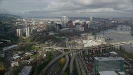 5.5K aerial stock footage flying over high-rises in South Waterfront and Interstate 5 toward Downtown Portland, Oregon Aerial Stock Footage | AX153_036E