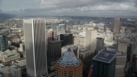 5.5K aerial stock footage flying over KOIN Center and Wells Fargo Bank Center among city buildings; Downtown Portland, Oregon Aerial Stock Footage | AX153_038E