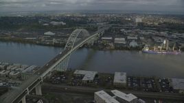 5.5K aerial stock footage flying by the Fremont Bridge spanning Willamette River, Portland, Oregon Aerial Stock Footage | AX153_042