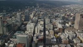 5.5K aerial stock footage tilting from Morrison Bridge to reveal and approach Downtown Portland, Oregon Aerial Stock Footage | AX153_093E