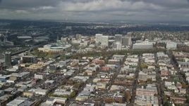 5.5K aerial stock footage passing the Oregon Convention Center and office buildings in Lloyd District, Portland, Oregon Aerial Stock Footage | AX153_101E