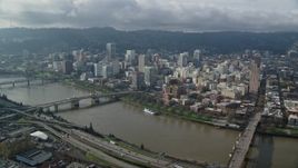 5.5K aerial stock footage crossing the Willamette River toward Downtown Portland, Oregon Aerial Stock Footage | AX153_105E