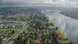 5.5K aerial stock footage flying over suburban homes between Highway 14 and Columbia River, Vancouver, Washington Aerial Stock Footage | AX153_143E
