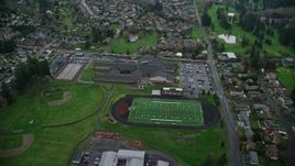 5.5K aerial stock footage orbiting an elementary school and high school in Washougal, Washington Aerial Stock Footage | AX153_168E