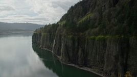 5.5K aerial stock footage approaching a railroad tunnel and Cape Horn Falls in Columbia River Gorge, Washington Aerial Stock Footage | AX154_009E