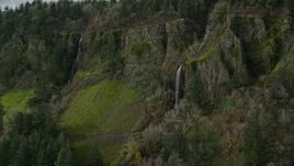 5.5K aerial stock footage tracking Cape Horn Falls through steep cliffs in Columbia River Gorge, Washington Aerial Stock Footage | AX154_011