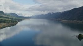5.5K aerial stock footage flying over the Columbia River through Columbia River Gorge, Washington Aerial Stock Footage | AX154_015E