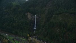5.5K aerial stock footage approaching Multnomah Falls on a Columbia River Gorge cliff face in Multnomah County, Oregon Aerial Stock Footage | AX154_019E