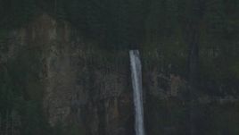 5.5K aerial stock footage flying away from Multnomah Falls on the Oregon side of Columbia River Gorge Aerial Stock Footage | AX154_021