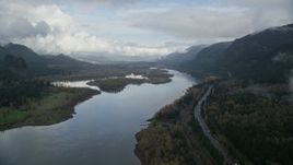 5.5K aerial stock footage following the river and I-84 toward islands in the Columbia River Gorge Aerial Stock Footage | AX154_024E