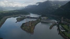 5.5K aerial stock footage flying by the Bonneville Dam in Columbia River Gorge Aerial Stock Footage | AX154_029E