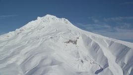 5.5K aerial stock footage of steep Mount Hood slopes with snow, Mount Hood, Cascade Range, Oregon Aerial Stock Footage | AX154_085